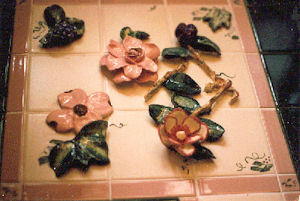 Close up of flowers in mural behind the stove