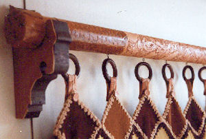 Leather covered curtain rod #1.